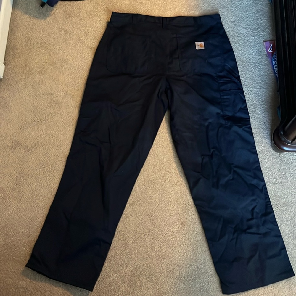 Men’s 34x30 FR Carhartt dark blue work pants band new never worn